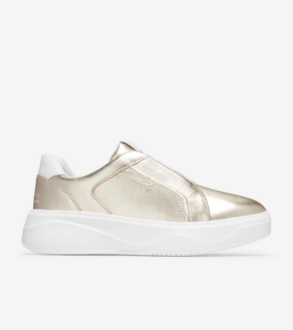 Cole Haan Free Shipping Women's GrandPro Demi Slip On Sneaker - Gold Talca-Optic White